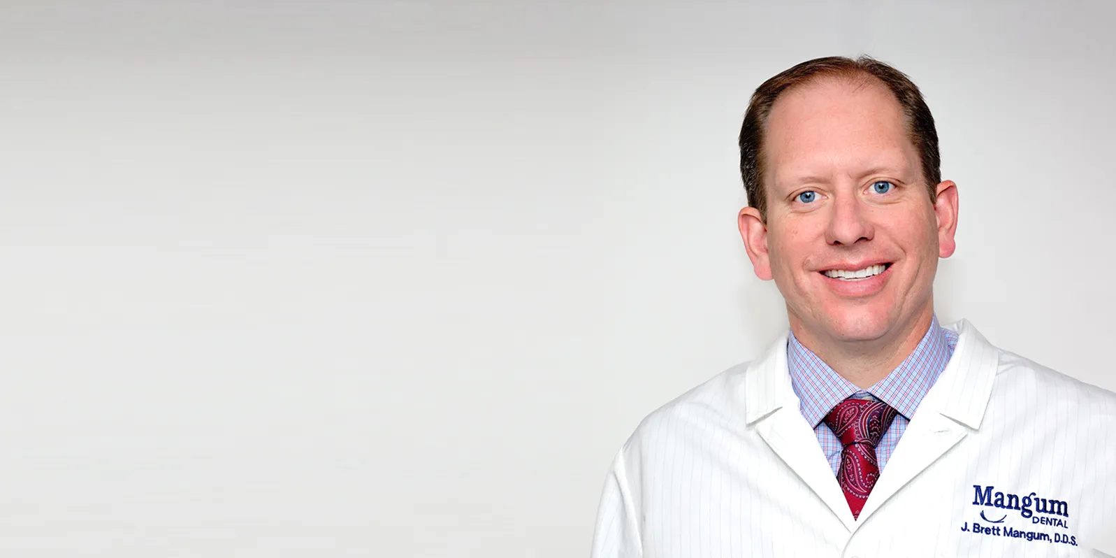 Portrait of Dr J. Brett Mangum